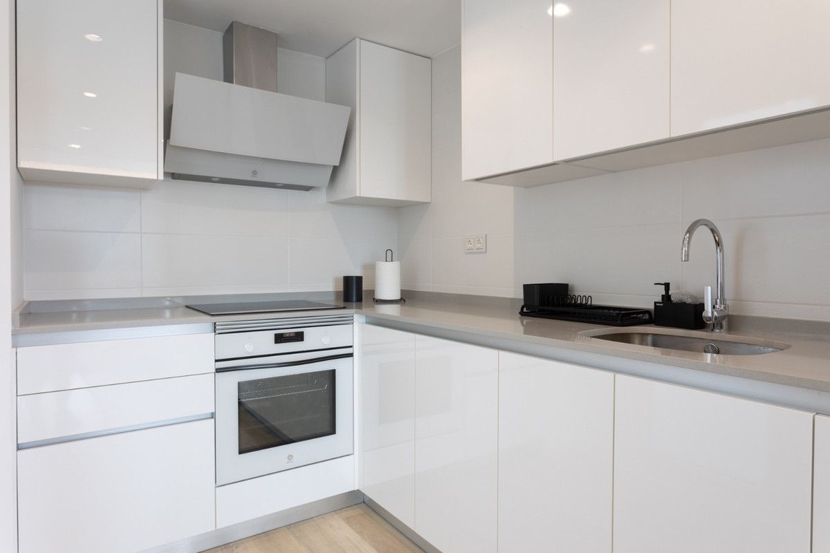 Appartement op de middelste verdieping in Nueva Andalucía, Nueva Andalucía, 9/12