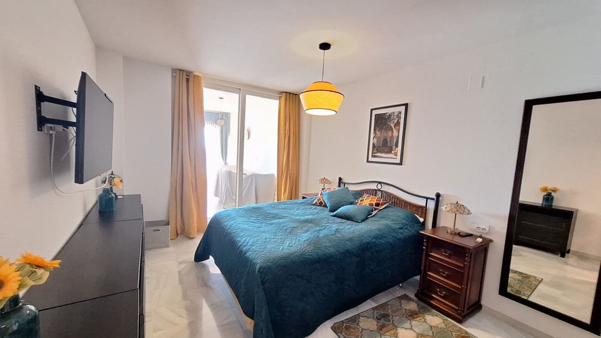 Lägenhet på mellanvåningen i Estepona, Estepona, 7/12